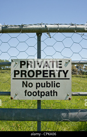 Private property sign on a metal gate. Stock Photo