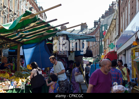 Fruit stall in street market Brixton Stock Photo