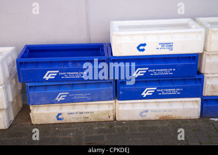 Blue plastic fish boxes hi-res stock photography and images - Alamy