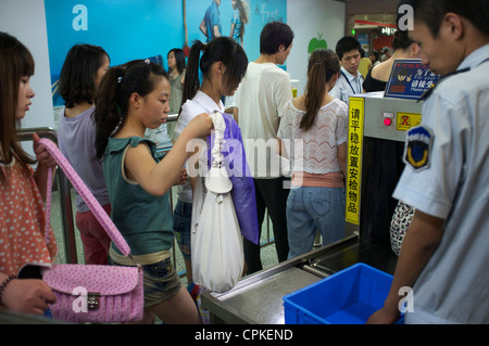 Subway security bag check in Beijing, China. 25-May-2012 Stock Photo