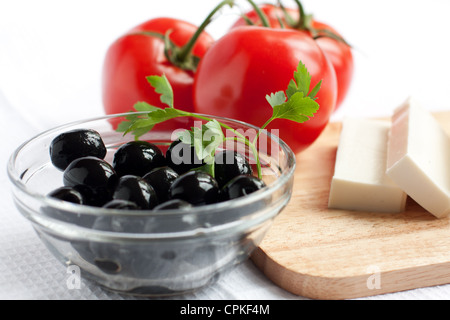 Olives in a clear salad bowl Stock Photo