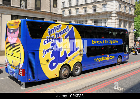 Megabus low cost intercity coach service operated by the Stagecoach group leaving London for Cardiff Megabus.com advertising England UK Stock Photo