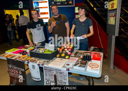 Paris, France, Act Up Paris, AIDS Activists, Small Group People, Selling Paraphernalia at Stall in Hall of the Zenith Brigitte Concert (Mikael, Pierre) Volunteers in Europe Stock Photo