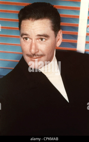 A colour portrait of the film star Errol Flynn taken in Los Angeles in 1954. Stock Photo