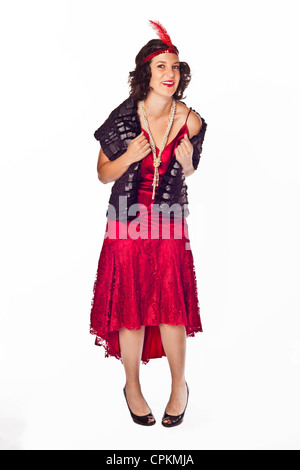 A brunette woman poses as a 1920's flapper in a lampshade dress Stock ...