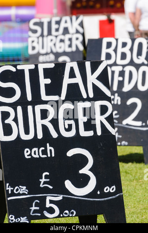 Chalk board advertising steak burgers for £3.00 Stock Photo