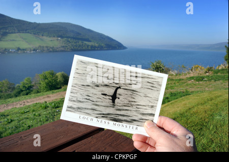 SOUVENIR POSTCARD SHOWING FAMOUS  'SURGEONS PHOTOGRAPH' OF THE LOCH NESS MONSTER WITH LOCH NESS SCOTLAND IN BACKGROUND  UK Stock Photo