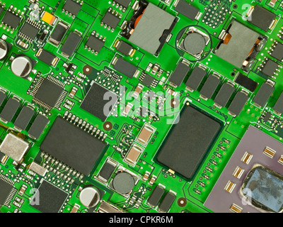 Macro detail of a complicated mother circuit board. Stock Photo