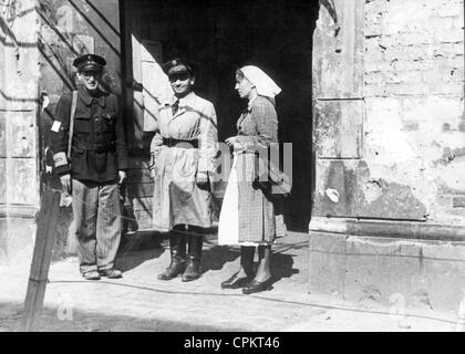 Ghetto police and nurse in the Warsaw Ghetto Stock Photo