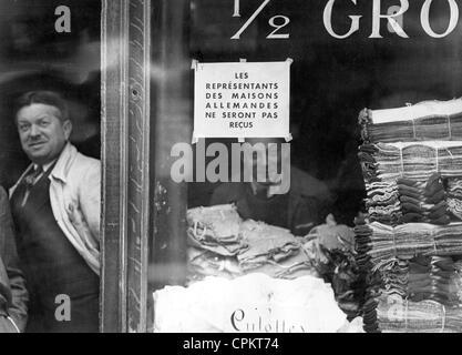 A Jewish-owned shop in Paris displays a sign reading 'German tradesmen not welcome', as a response to the boycott of Jewish Stock Photo