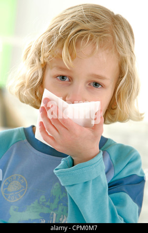 CHILD WITH RHINITIS Stock Photo