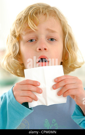 CHILD WITH RHINITIS Stock Photo