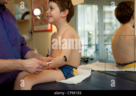 REFLEX SYMPTOMATOLOGY CHILD Stock Photo
