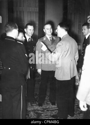 Adolf Hitler with Alfred Rosenberg on his birthday, 1938 Stock Photo