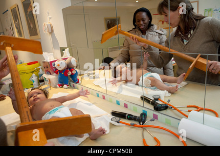 MEASURING HEIGHT, INFANT Stock Photo - Alamy