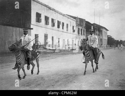 Soldiers on zebras in German East-Africa, 1911 Stock Photo