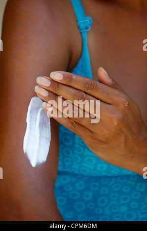 SHIELDING FROM SUNBURN Stock Photo