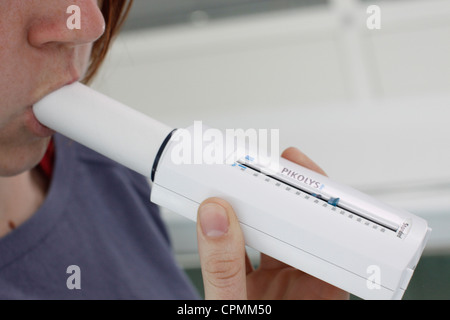 BREATHING, SPIROMETRY IN A WOMAN Stock Photo