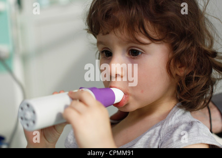 BREATHING, SPIROMETRY IN A CHILD Stock Photo