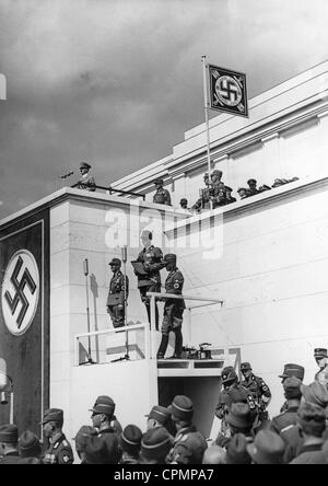 Lead singer of the Reich Labor Service, under the speaker's pulpit, 1937 Stock Photo