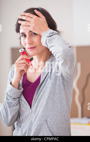 WOMAN WITH FEVER Stock Photo