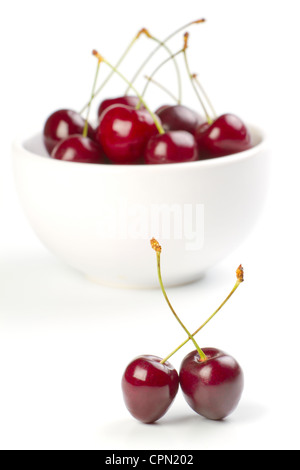 Red ripe cherries on white background Stock Photo