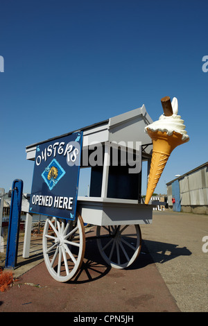 An Oyster and ice cream cart on the harbour at Whitstable, Kent. Stock Photo