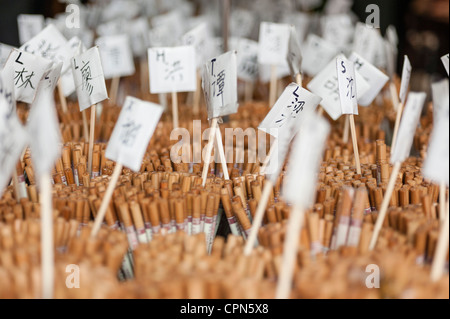 Personalized chopsticks bearing common surnames for sale in shop Stock Photo