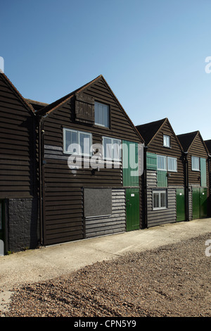 Re- furbished fisherman's huts at Whitstable, Kent. Now used as holiday homes. Stock Photo