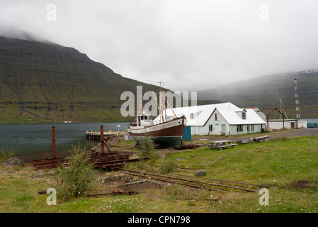 Boat drydocked in fishing village, Iceland Stock Photo
