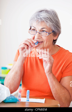 HOMEOPATHY, ELDERLY PERSON Stock Photo