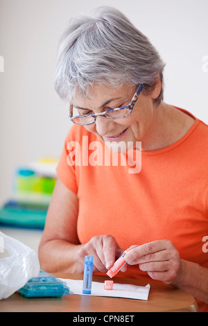 HOMEOPATHY, ELDERLY PERSON Stock Photo