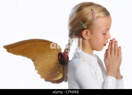 Christmas, girl in angel dress, wing for children from the time circa 1890, Additional-Rights-Clearance-Info-Not-Available Stock Photo