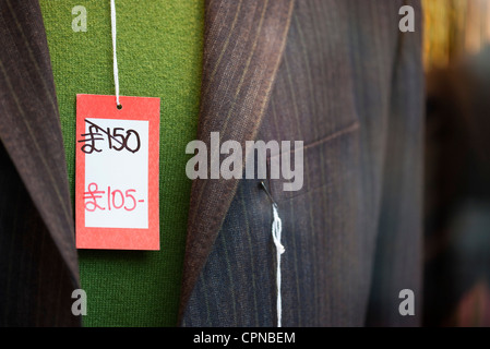 Sale tag on clothing Stock Photo