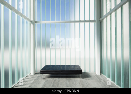 Empty bench in modern lobby Stock Photo