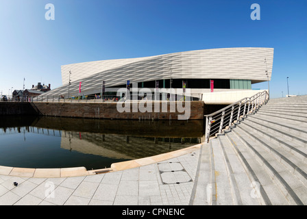 Museum of Liverpool reflected in the Leeds - Liverpool Canal  on Mann Island, Pier Head, Liverpool. Stock Photo