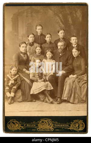 people,family,family with many children from Osnabrueck,group picture,Germany,circa 1880,extended family,extended families,large family,big family,parents,parent,ten,10,father,fathers,father of a family,mother,mothers,sons,son,daughter,daughters,girl,girls,boy,boys,posture,posturing,family photograph,ancestors,forefather,forefathers,abundance of children,with many children,child,children,kid,kids,a lot of,offspring,addition the family,family patriach,children's fashion,kids' fashion,middle classes,bourgeois,middle ,Additional-Rights-Clearences-Not Available Stock Photo