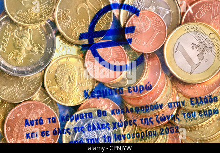 money / finances,coins,Greece,Euro Starterkit Greece,starter kit launched by the banks in the December 2001,January 2002 emitted for 5000 drachma to private customers,2002,euro coins,cents,euros,in the nominal value of 14.67 euro,cent coin,currency conversion,currency exchange,Greek,Grecian,symbol,symbols,symbol image,symbolism,imageries,symbolic,symbolical,euro launch,launch,start,Eurostar,euro price,member,members,euro zone,euro crisis,economic crisis,economic crunch,economic crises,economic crunches,cash,European,Europe,,Additional-Rights-Clearences-Not Available Stock Photo