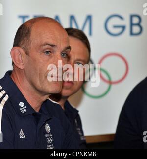 TOWER OF LONDON, LONDON, UK, Monday. 28/05/2012. BOA Announce Shooting Athletes Selected to Team GB for London 2012 Olympics at Tower of London. Phil Scanlan (Team GB Shooting Team Leader) is watched by Andy Hunt (Team GB Chef de Mission). Stock Photo