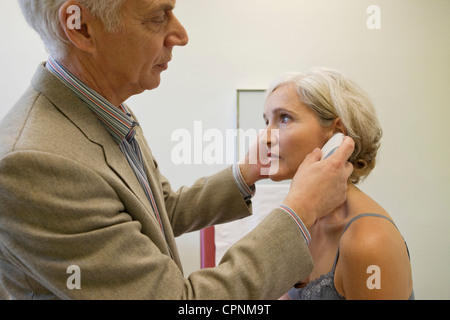 TEMPERATURE ELDERLY PERSON Stock Photo