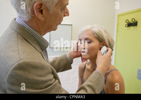 TEMPERATURE ELDERLY PERSON Stock Photo