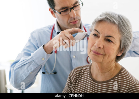 TEMPERATURE ELDERLY PERSON Stock Photo