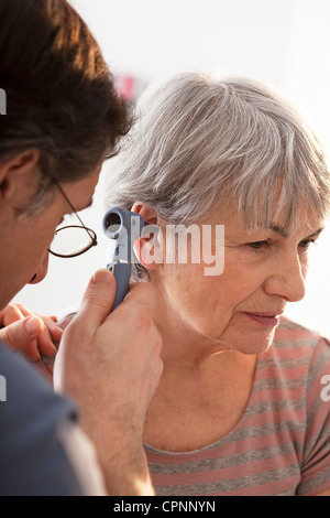 EAR NOSE &THROAT, ELDERLY PERSON Stock Photo