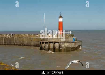 Watchet Somerset Uk. Harbour harbor wall and Lighthouse. HOMER SYKES