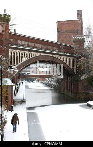 Snow covered Rochdale Canal looking towards 92	Duke's Lock, from Deansgate Manchester in the Castlefield area Stock Photo
