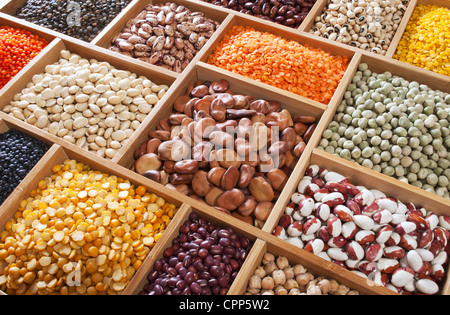 peas, beans and lentils in the wooden box Stock Photo