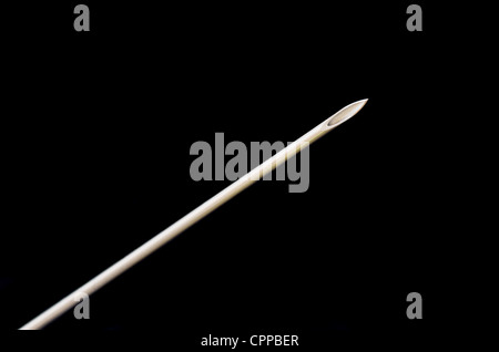 hypodermic needle point macro with black background Stock Photo