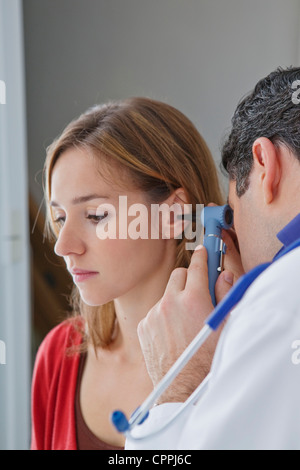 EAR NOSE & THROAT, WOMAN Stock Photo