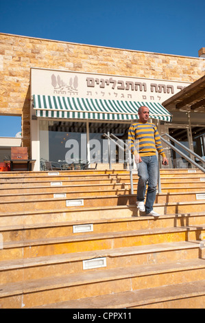 Middle East Israel a chain of spice stores and cafes called Spice Way - man walking out from the shop Stock Photo