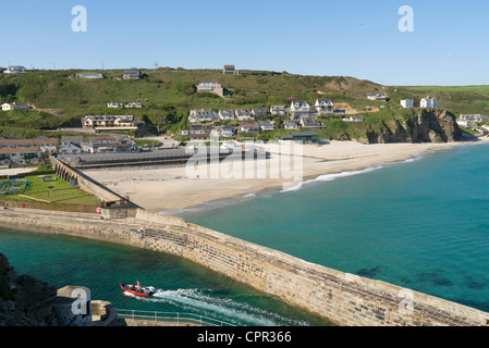 Portreath seaside village beach and pier from the cliff edge on Lighthouse hill.  Cornwall UK. Stock Photo